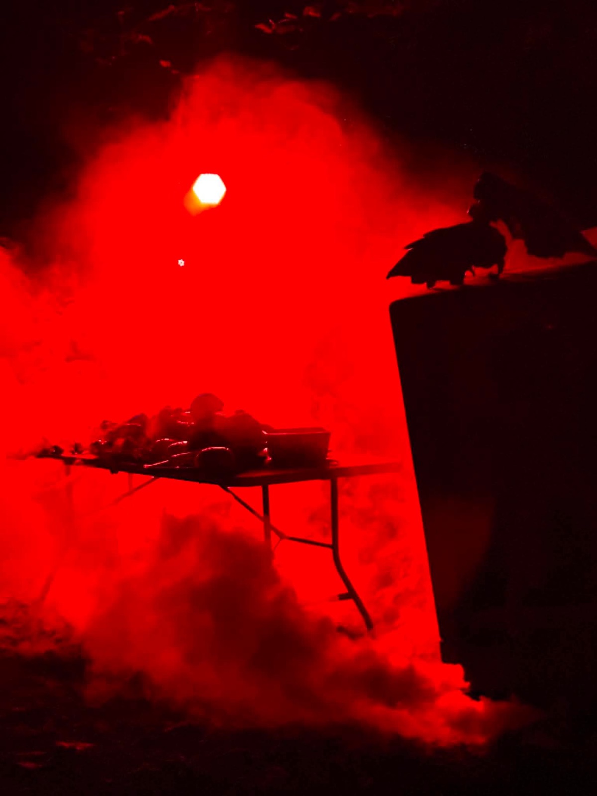 Red fog over the butcher's table, after dark at Haunted Holler